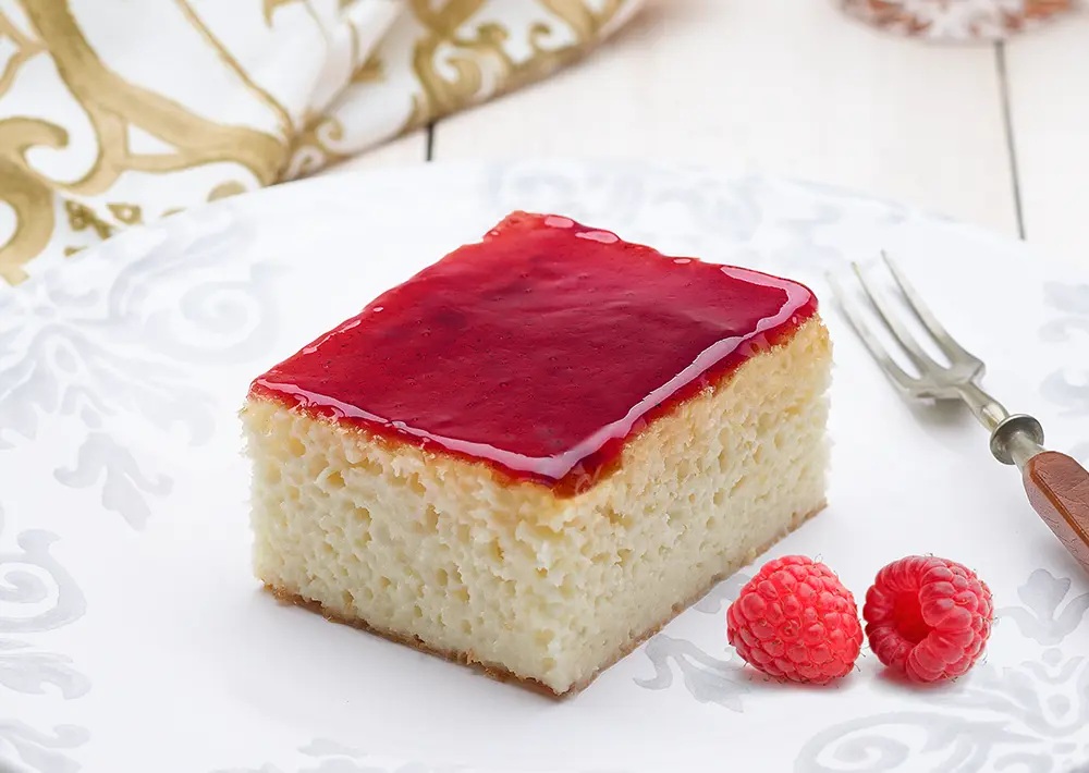 Tres Leches Cake with Raspberry Sauce